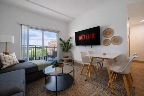 Modern 4BR with Balcony and City Skyline Views - Image 1